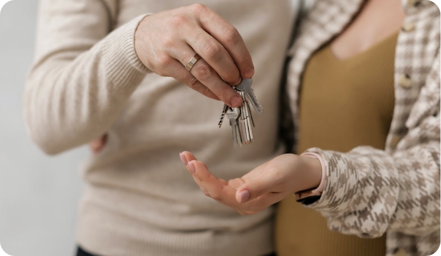 Couple holding keys